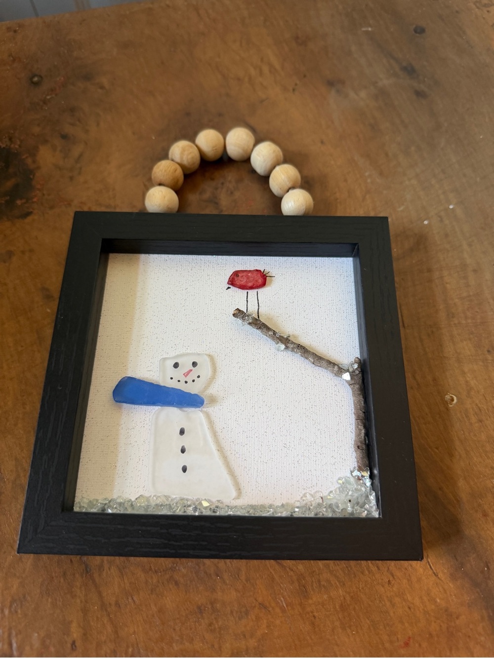 Handcrafted Black Framed Snowman Wall Art with Blue Scarf and Red Bird
